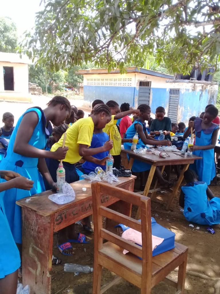 Pupils engaged in ecobrick making at St Charles Lwanga Primary in Bo