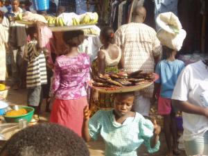 Food sellers carrying produce