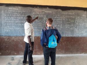 A class 6 teacher discussing his maths lesson