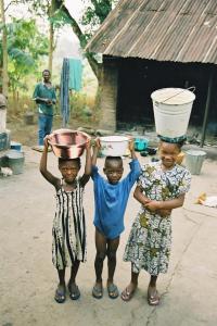 Children carrying water