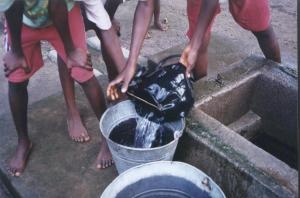 Pouring water from well