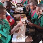 Children with arithmetic sticks